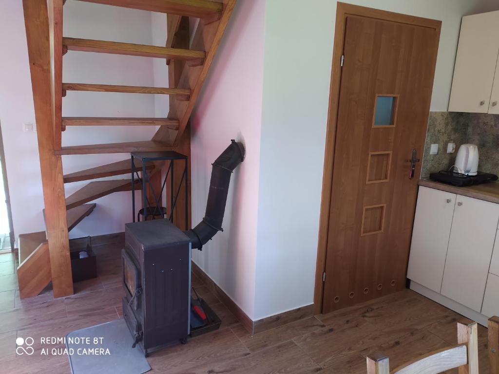 Kuchyňa alebo kuchynka v ubytovaní Domki pod Dębami