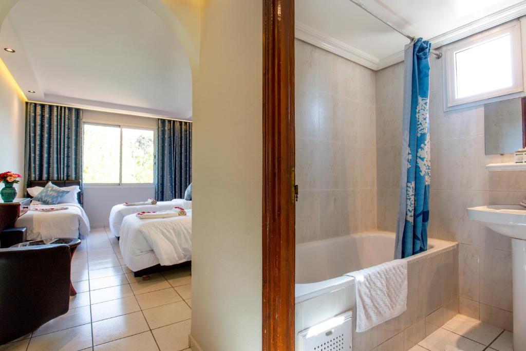 Koupelna v ubytování Hotel Akabar