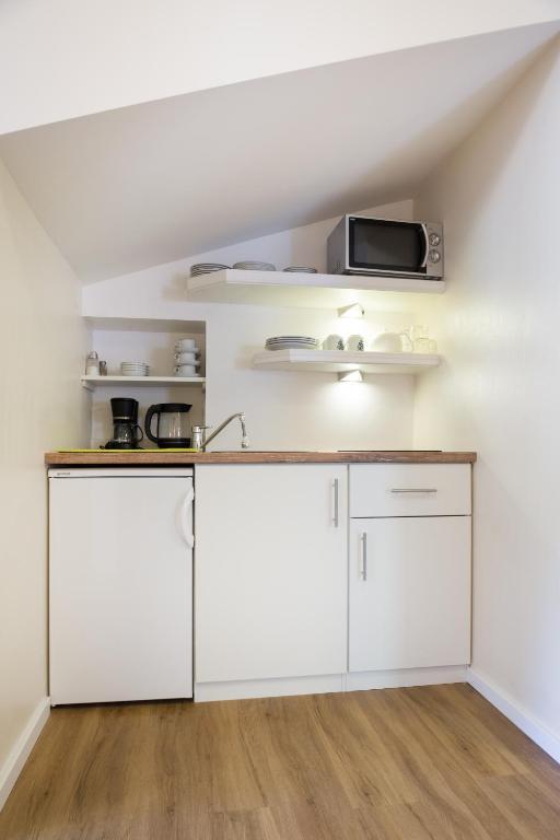 Kuchyň nebo kuchyňský kout v ubytování Hotel Garni Keil