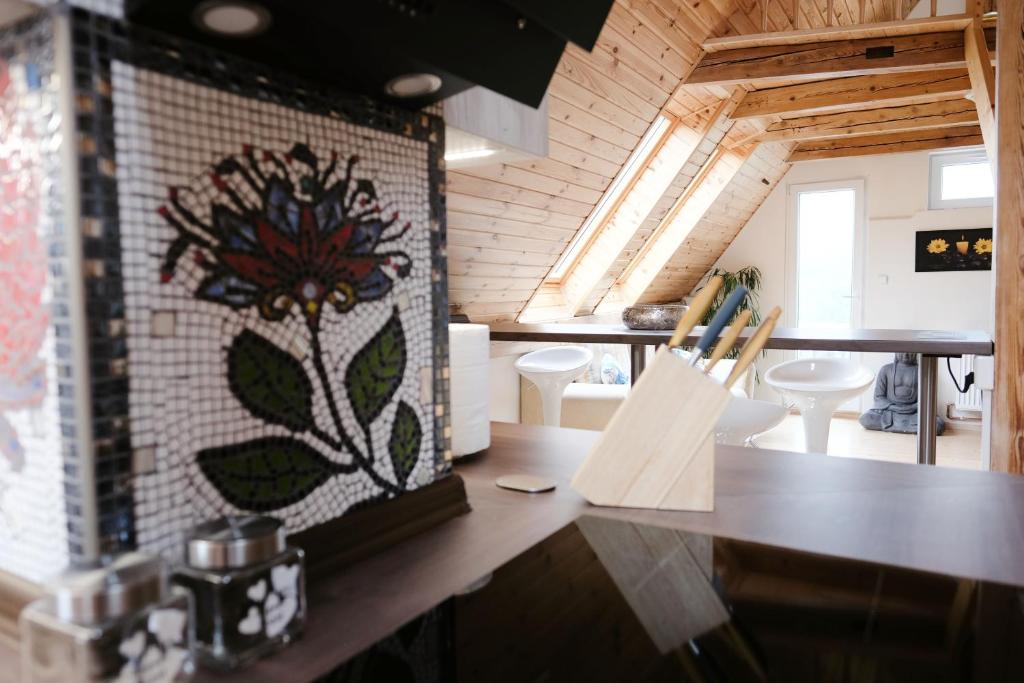 Fotografie z fotogalerie ubytování art-house 3 attic apartment with terrace v destinaci Děčín