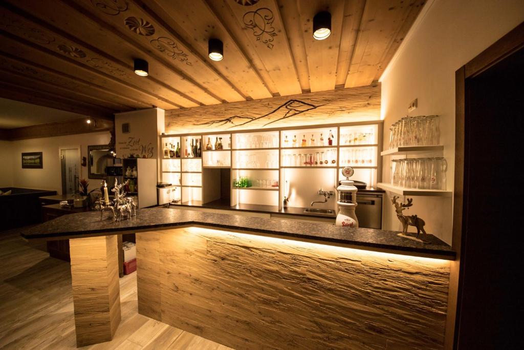 Kuchyň nebo kuchyňský kout v ubytování Hotel Garni Wolfgang