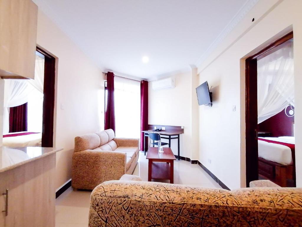 TV a/nebo společenská místnost v ubytování Divine Homes Resort Kisumu