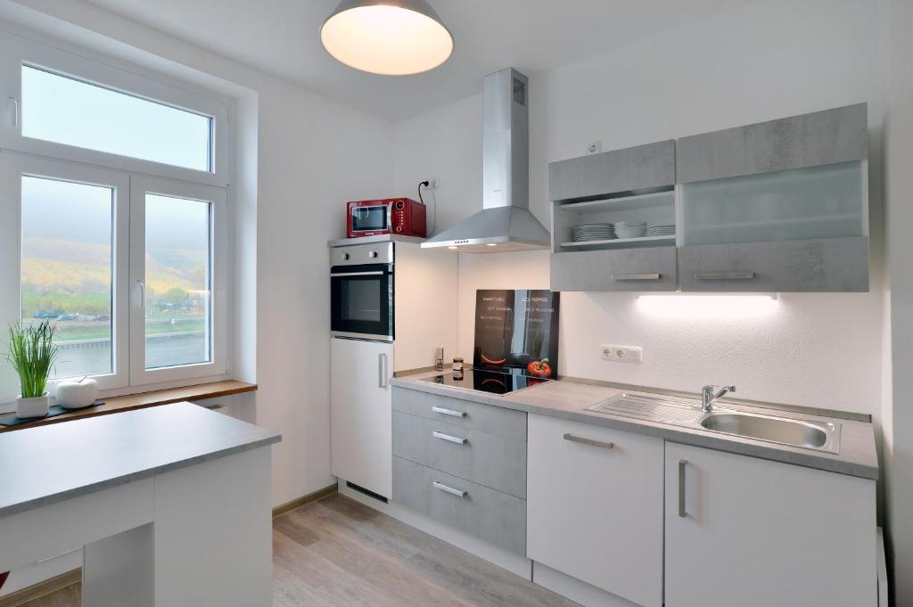 Kuchyň nebo kuchyňský kout v ubytování Ferienhaus Maja