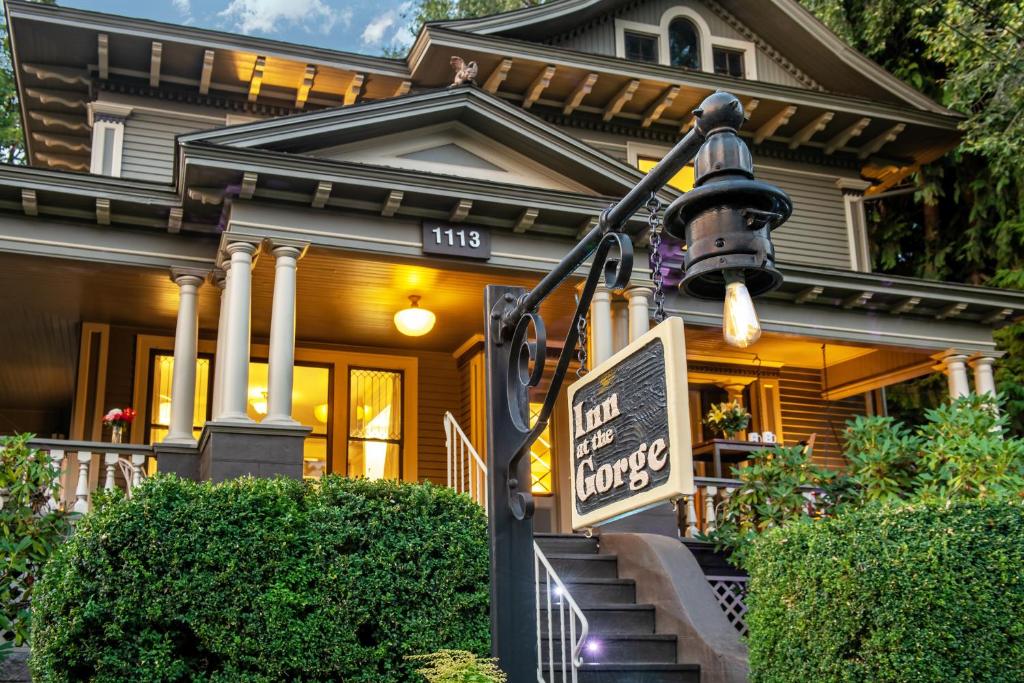 a house with a sign in front of it at Inn at the Gorge in Hood River