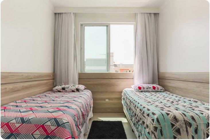  Ótimo apartamento na linda praia de Palmas SC com sacada e 2 garagens
