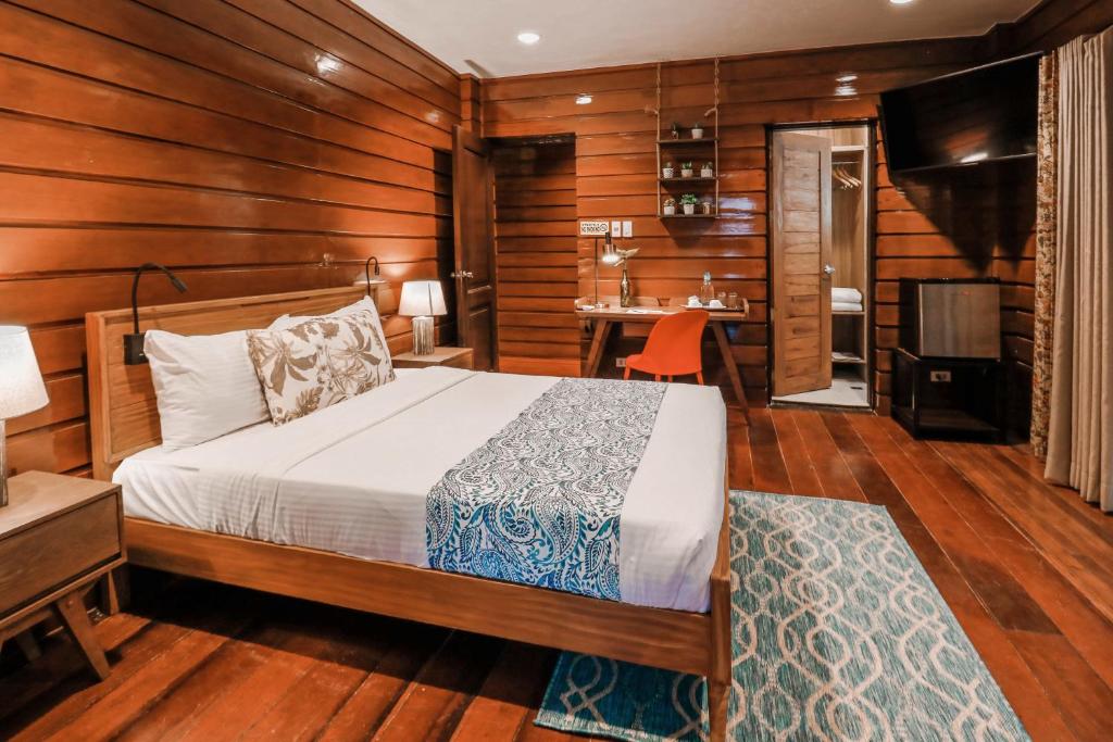 Postel nebo postele na pokoji v ubytování Hotel Kimberly Tagaytay