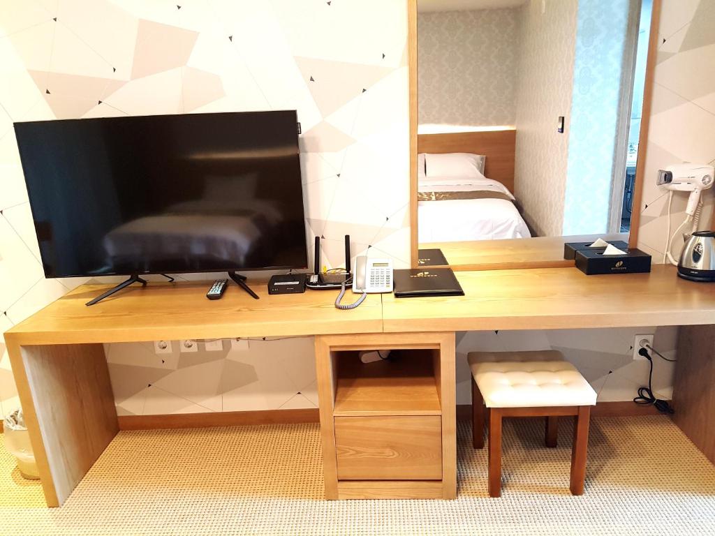 Kuchyň nebo kuchyňský kout v ubytování YangYang International Airport Hotel