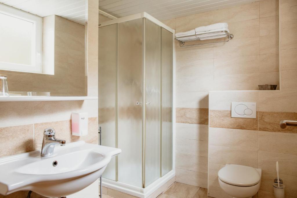 Koupelna v ubytování Apartments Kristan