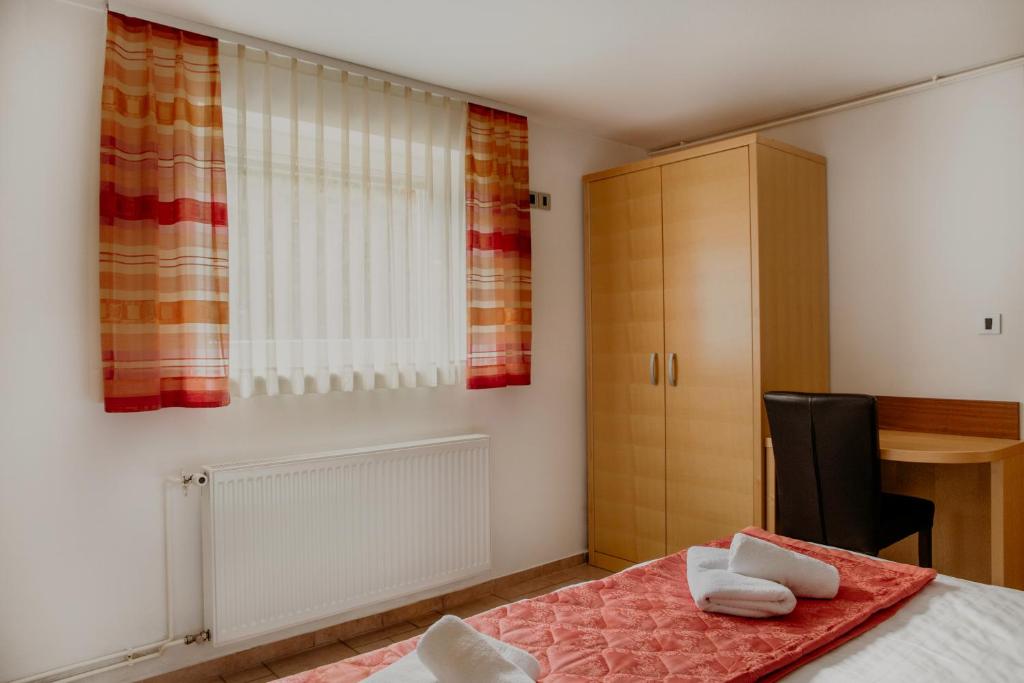 Postel nebo postele na pokoji v ubytování Apartments Kristan