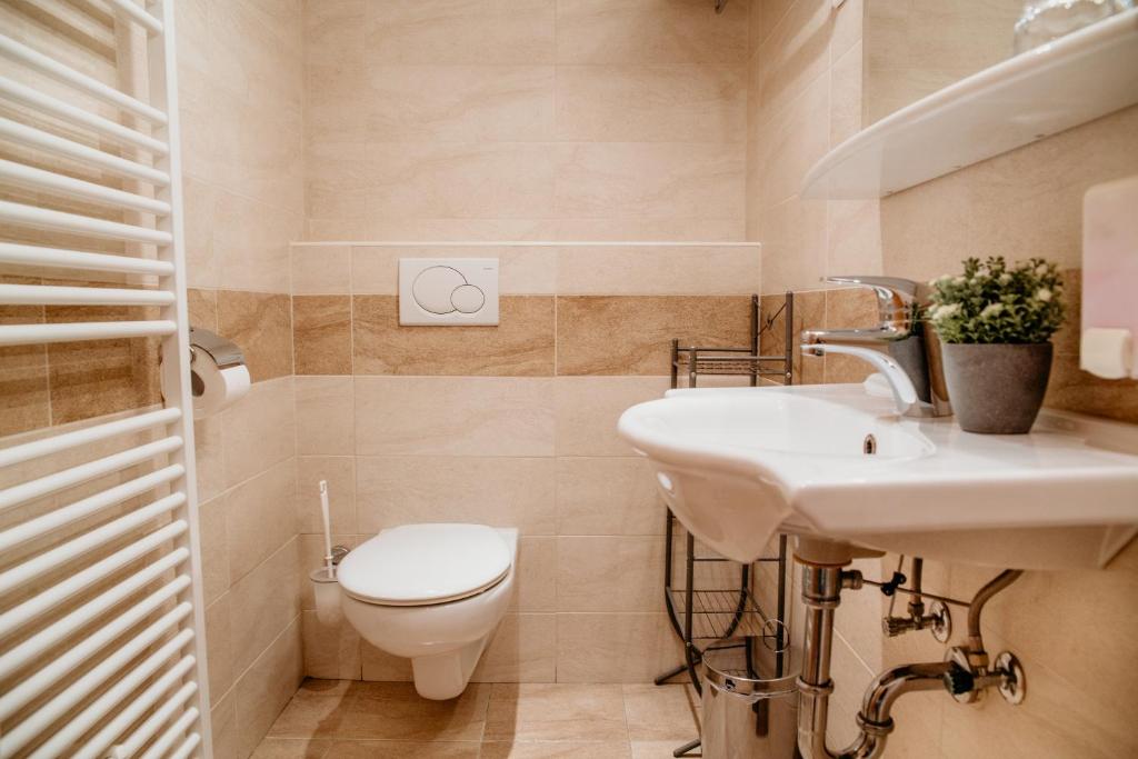 Koupelna v ubytování Apartments Kristan