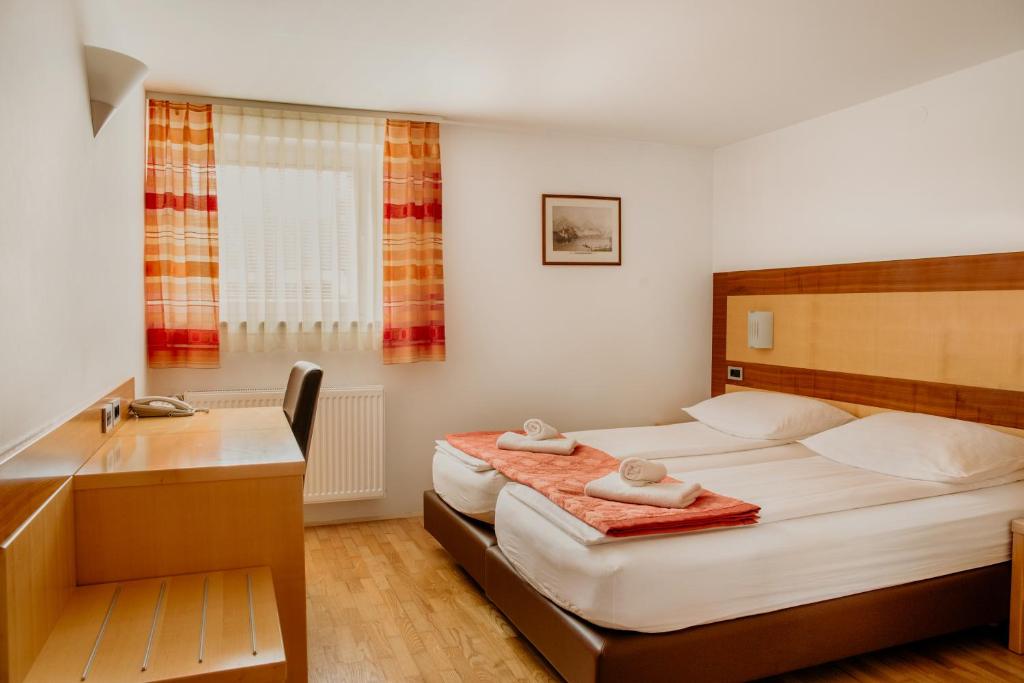 Postel nebo postele na pokoji v ubytování Apartments Kristan