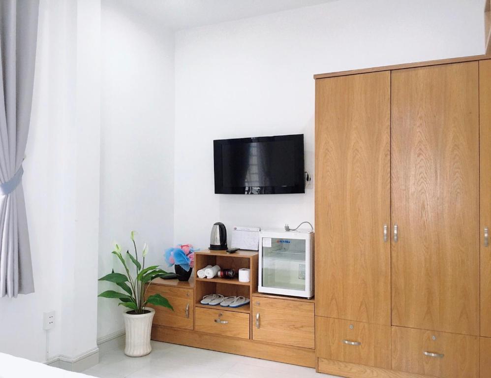 TV a/nebo společenská místnost v ubytování Hello SaiGon Homestay