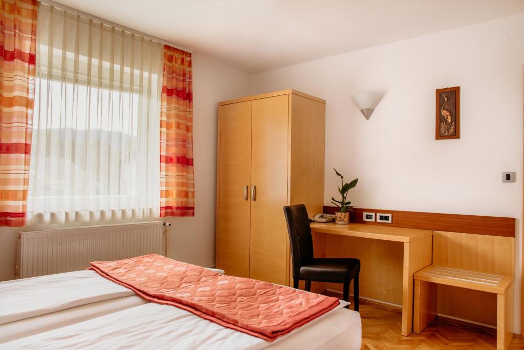 Postel nebo postele na pokoji v ubytování Apartments Kristan