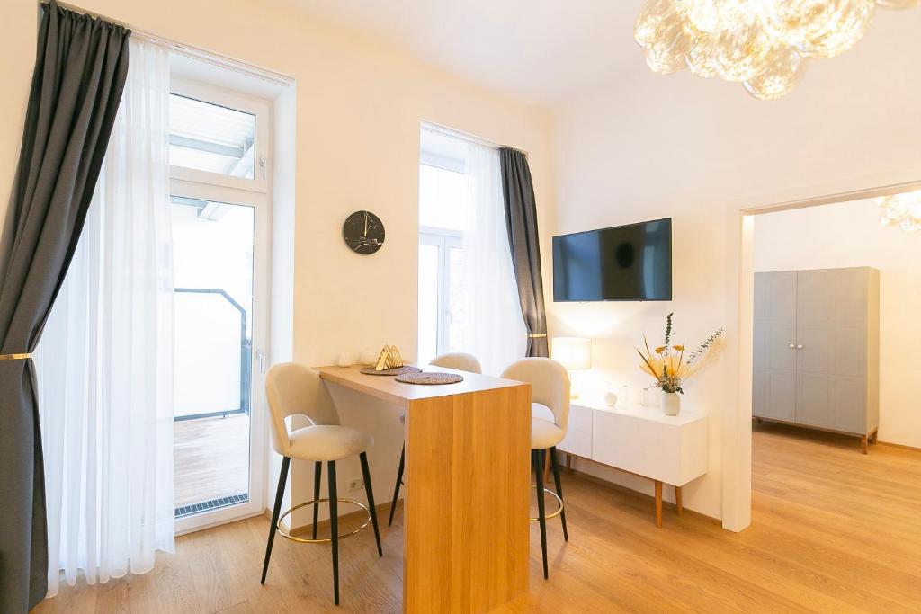 TV a/nebo společenská místnost v ubytování Mint@Naschmarkt Premium Apartments