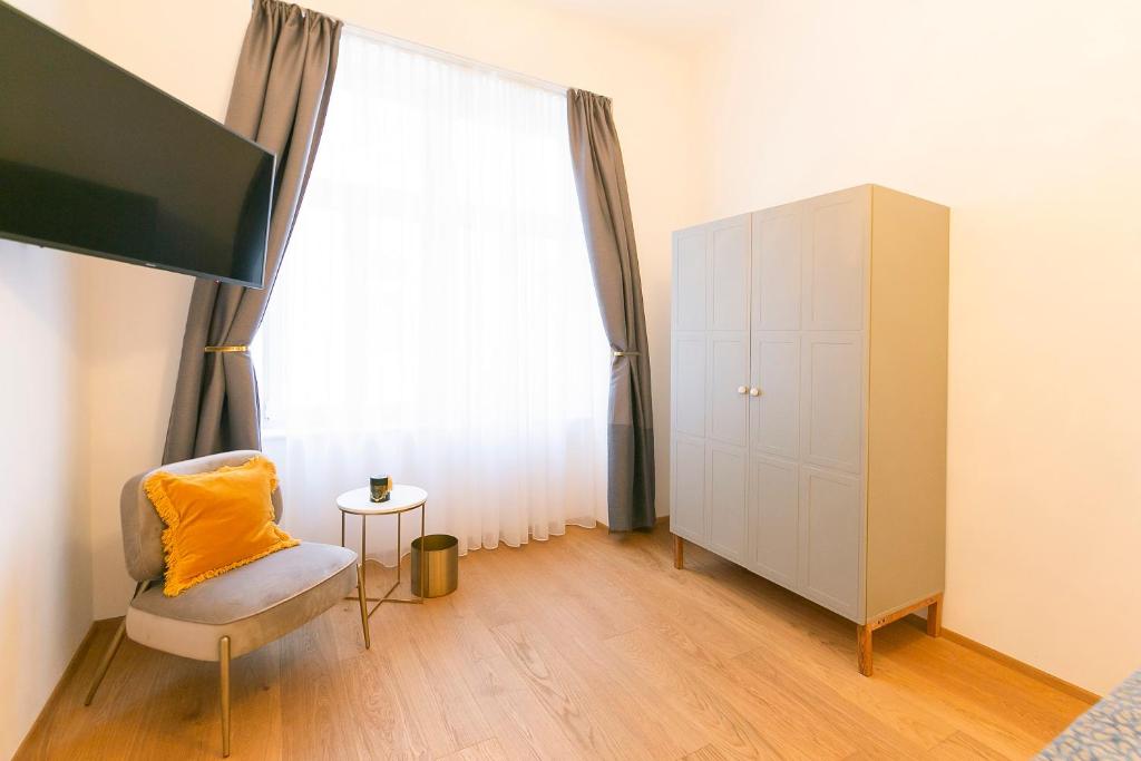 TV a/nebo společenská místnost v ubytování Mint@Naschmarkt Premium Apartments
