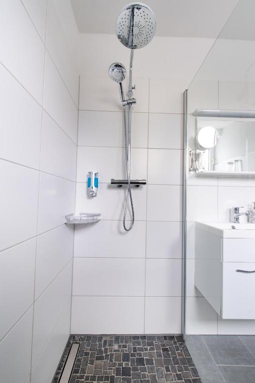 Koupelna v ubytování SOVA Hotel