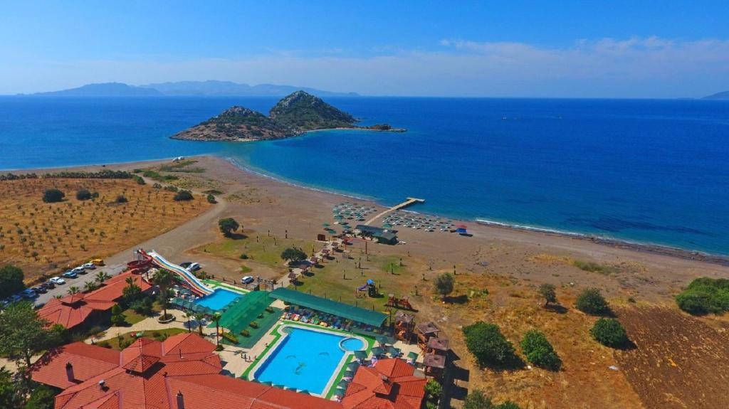 an aerial view of a resort and the beach at Adaburnu Gölmar Hotel in Datca
