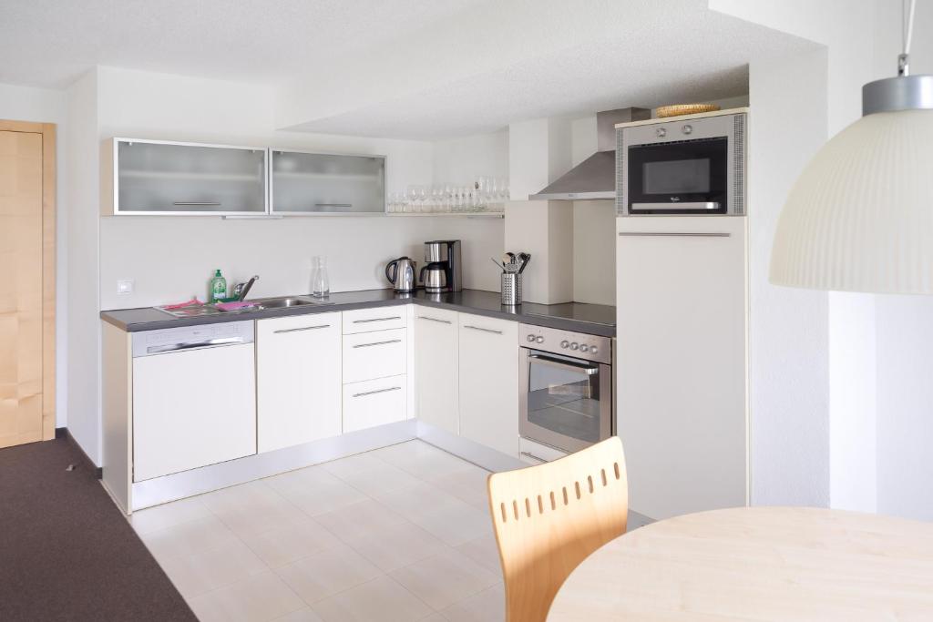 Kuchyň nebo kuchyňský kout v ubytování Bohemia Apartments