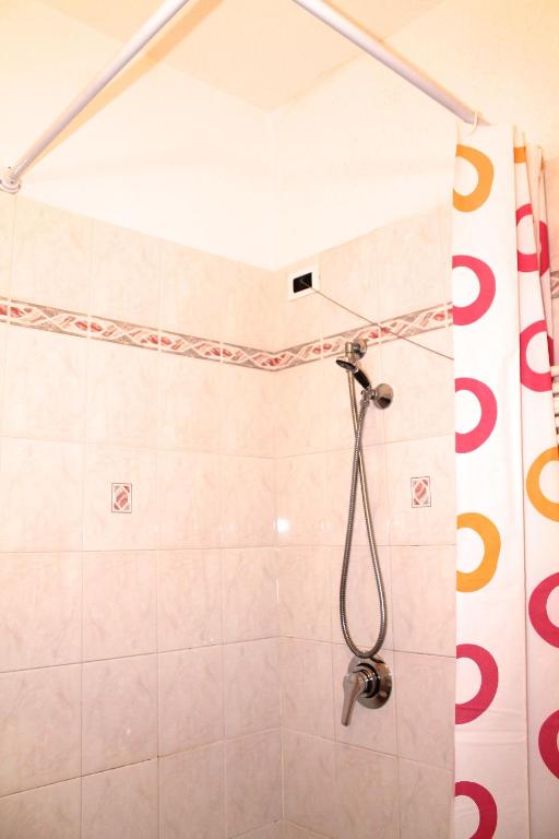 Koupelna v ubytování Hotel I 4 Assi