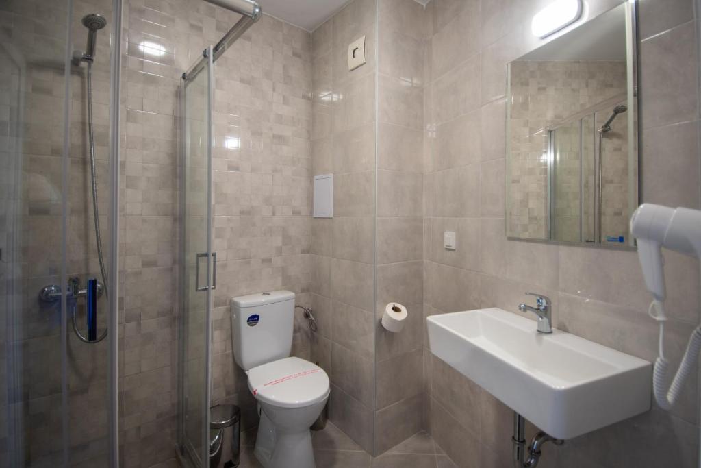 Koupelna v ubytování Ariana Hotel