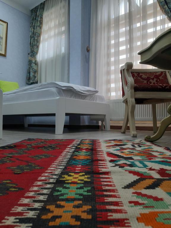Postel nebo postele na pokoji v ubytování Hotel Lula