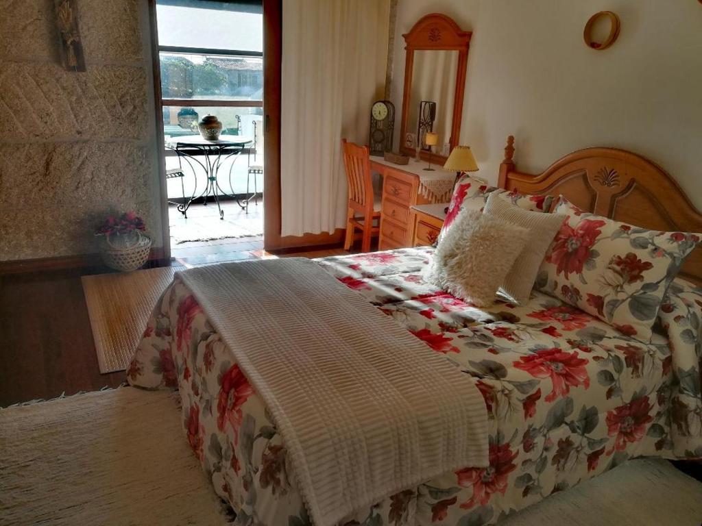 Postel nebo postele na pokoji v ubytování Caserio de Fontes