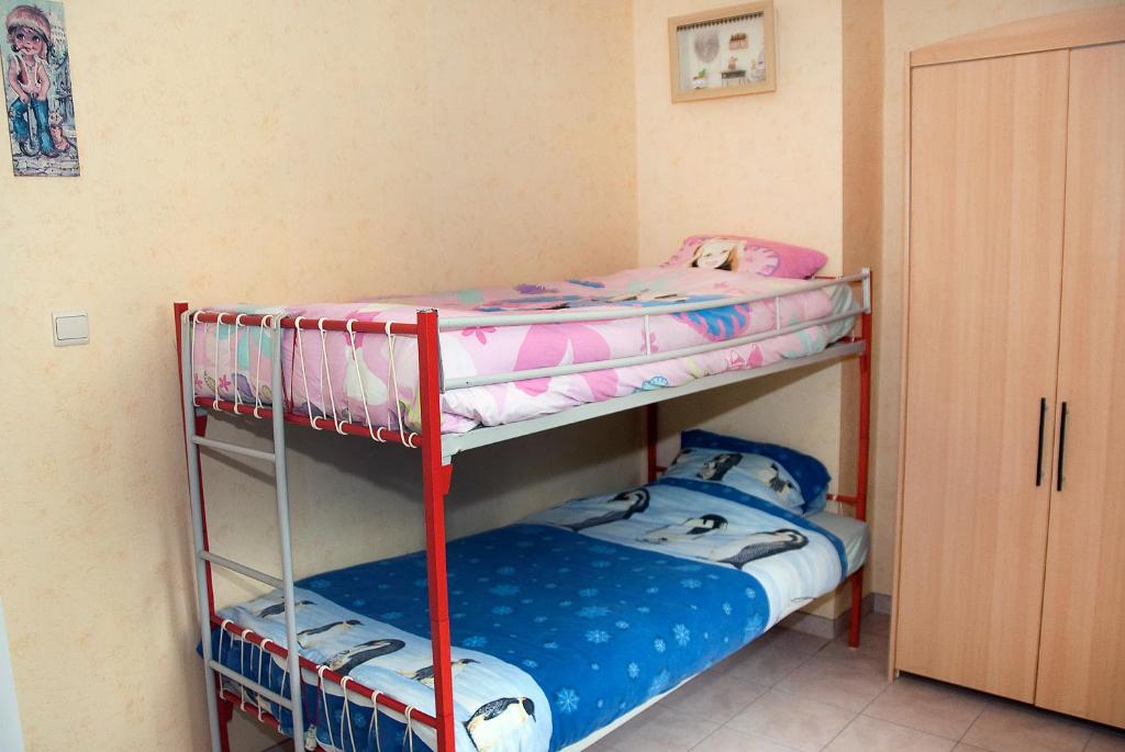 Postel nebo postele na pokoji v ubytování Holiday Home Le Pihon