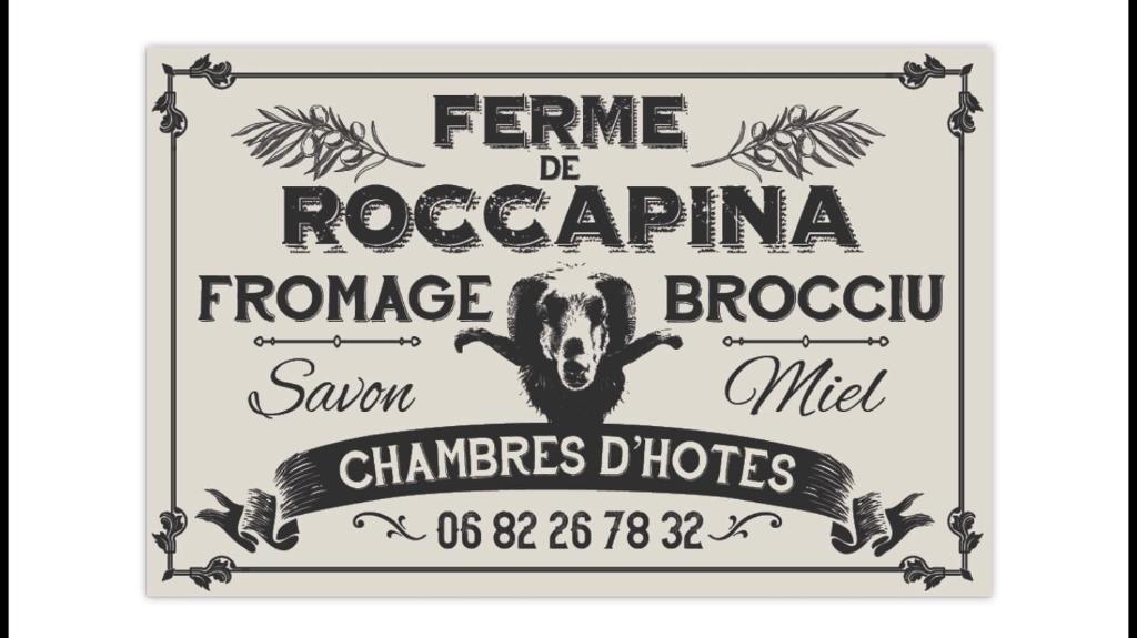 a poster for a steak restaurant with a skull and crossbones at Ferme de Roccapina in Sarragia