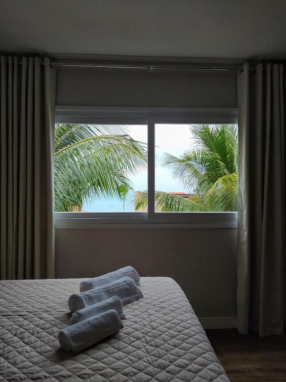 Uma cama ou camas num quarto em Pousada Vila Dos Mares