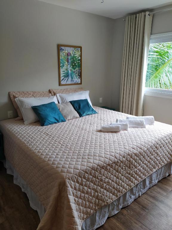Uma cama ou camas num quarto em Pousada Vila Dos Mares