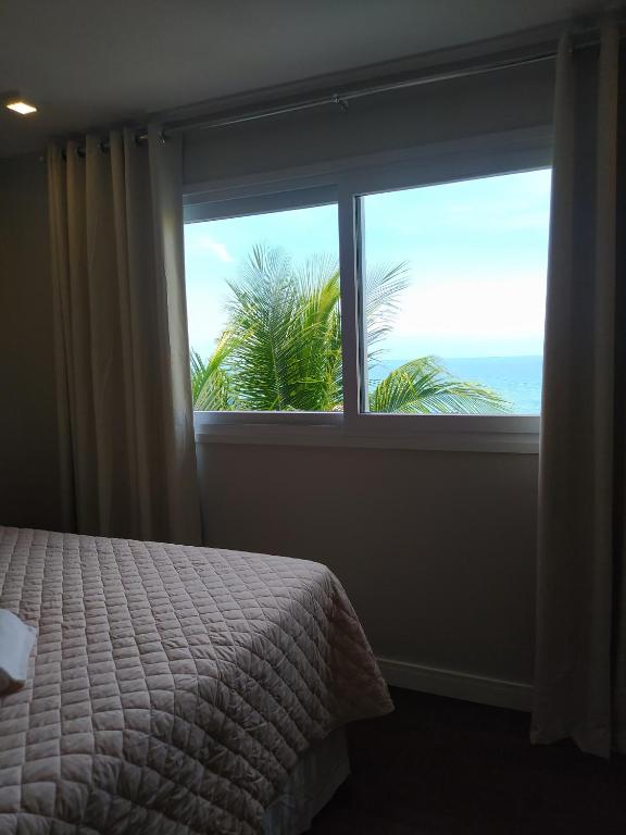 Uma cama ou camas num quarto em Pousada Vila Dos Mares