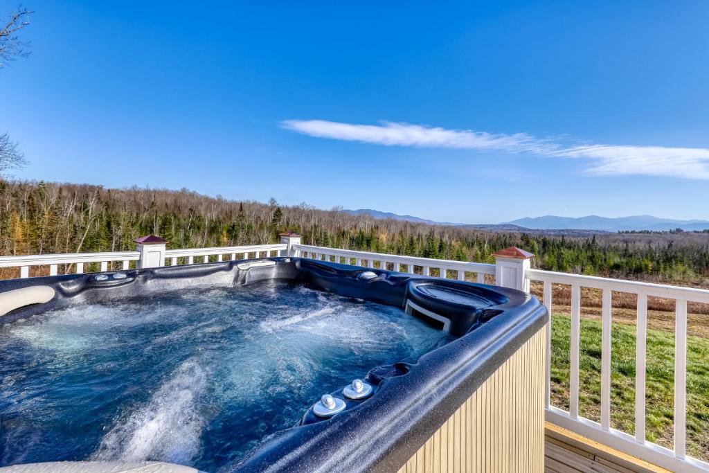 a hot tub on the deck of a house at Martin Grandview Estate in Lancaster