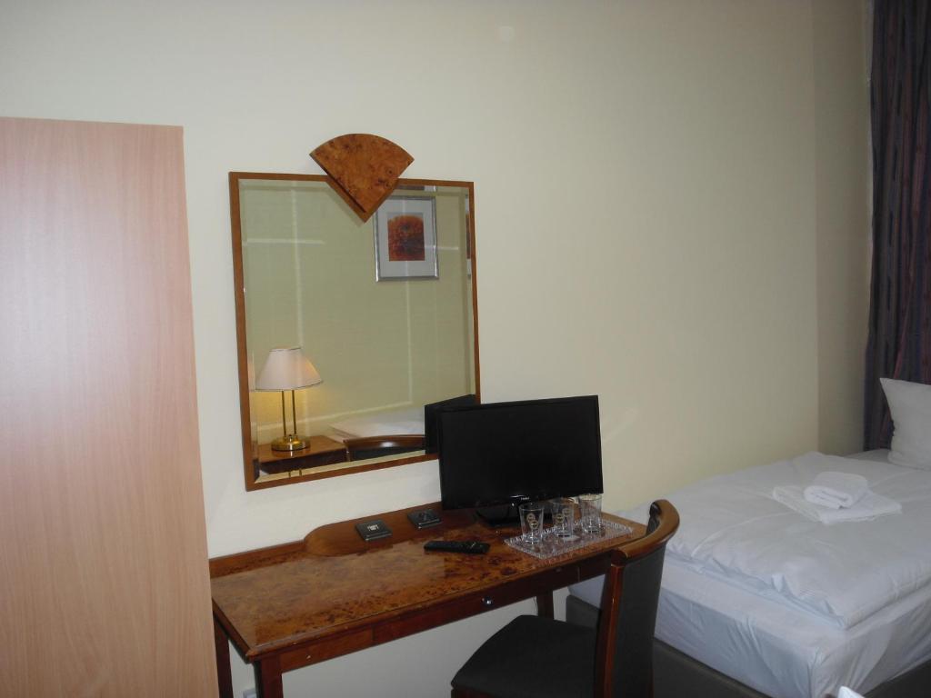 Postel nebo postele na pokoji v ubytování Hotel Amadeus Central