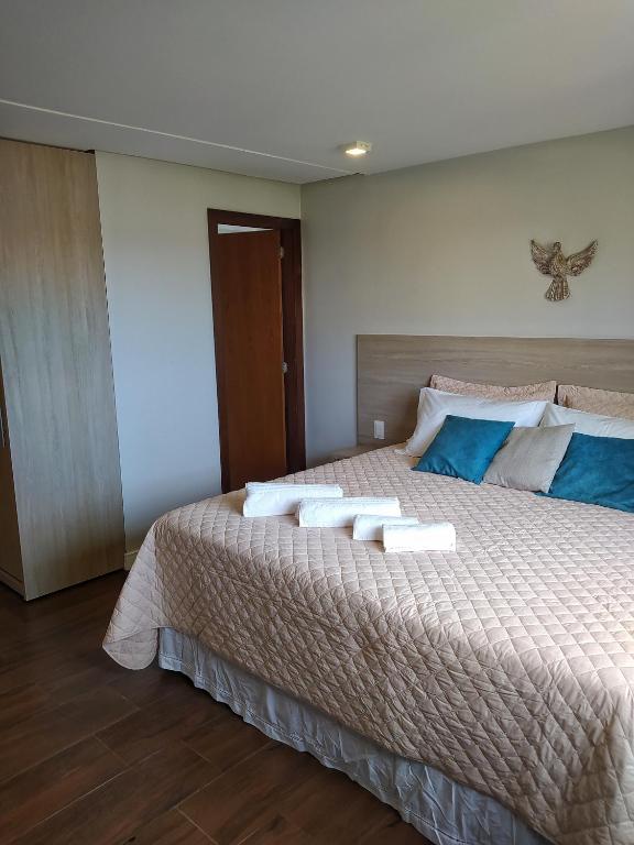 Uma cama ou camas num quarto em Pousada Vila Dos Mares