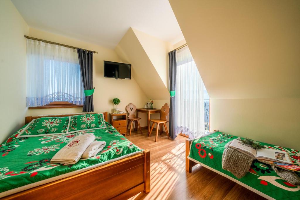 Posteľ alebo postele v izbe v ubytovaní Willa Sulejowka
