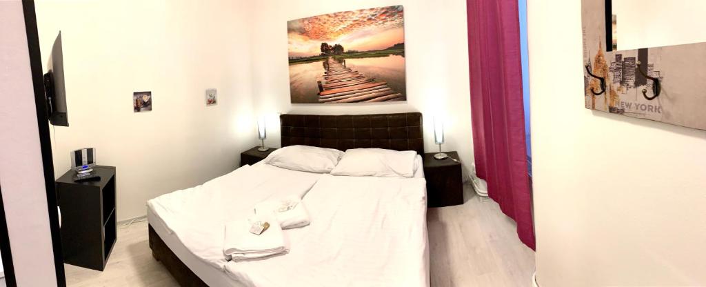 Postel nebo postele na pokoji v ubytování Hotel Stará Pošta