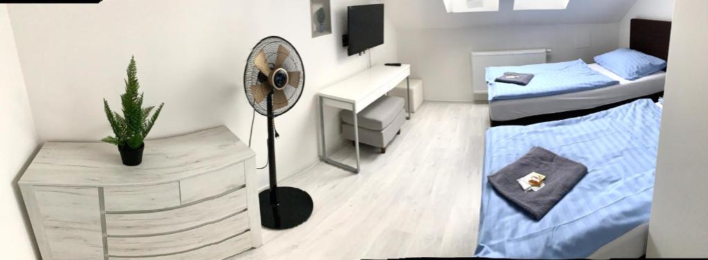 Postel nebo postele na pokoji v ubytování Hotel Stará Pošta
