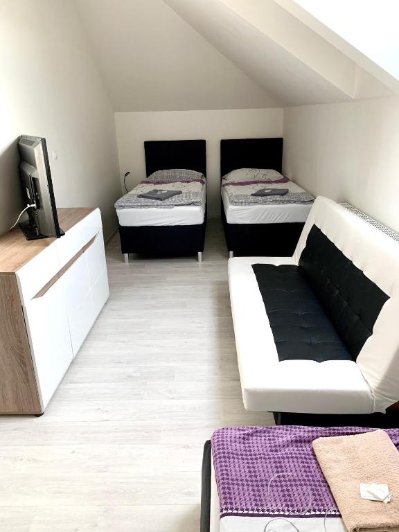 Postel nebo postele na pokoji v ubytování Hotel Stará Pošta