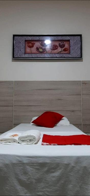 Postel nebo postele na pokoji v ubytování Hotel Central Gold