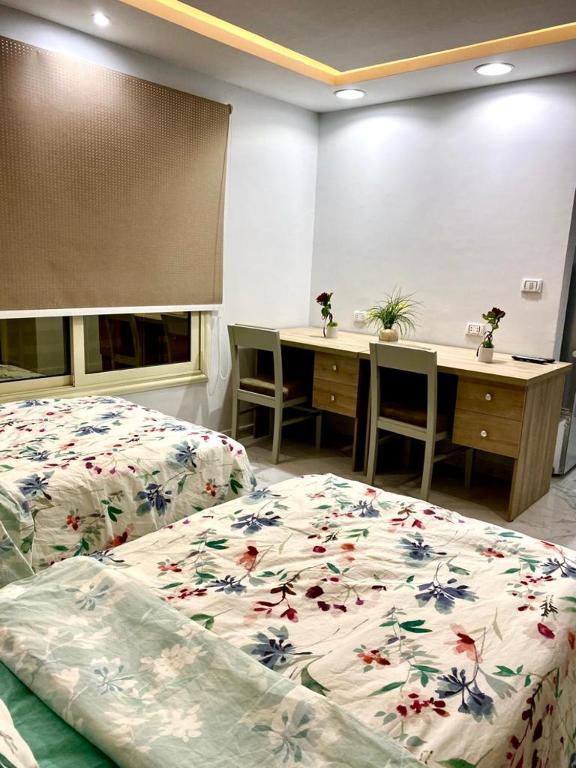 A bed or beds in a room at Hostel 390