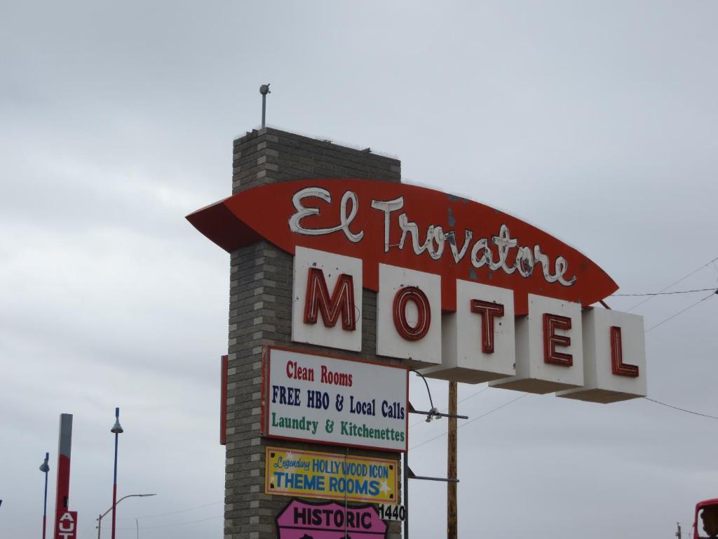 
a sign that is on the side of a building at El Trovatore Motel in Kingman
