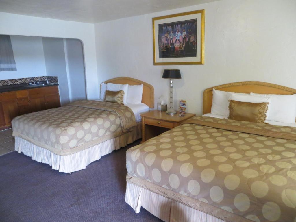 Postel nebo postele na pokoji v ubytování El Trovatore Motel