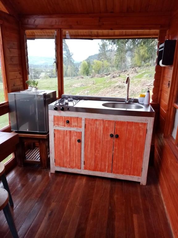 Kuchyň nebo kuchyňský kout v ubytování La Sarita, Hospedaje rural.