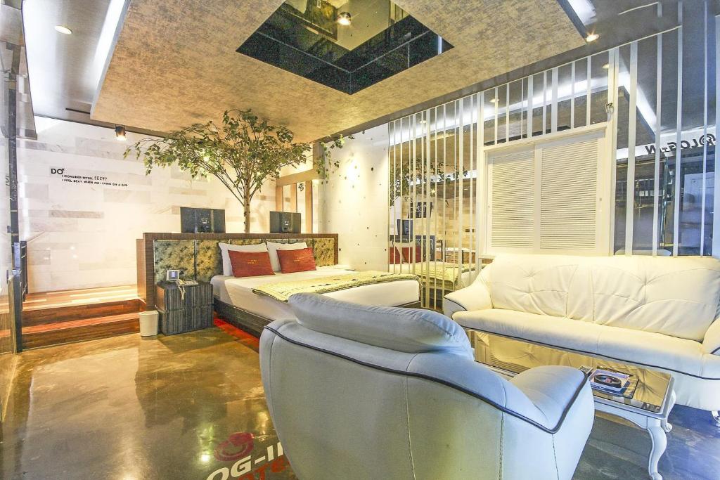 Posezení v ubytování Login Hotel