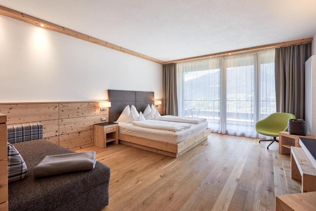 Postel nebo postele na pokoji v ubytování Hotel Fischer