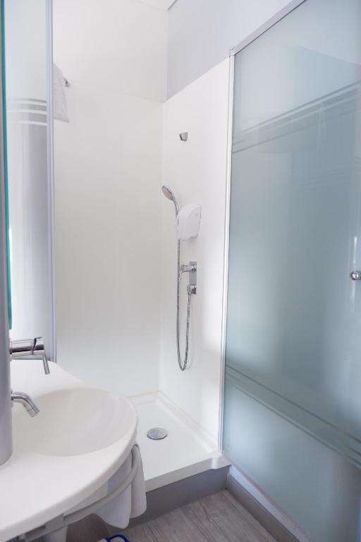 Koupelna v ubytování MD 7 Hotel Cirebon