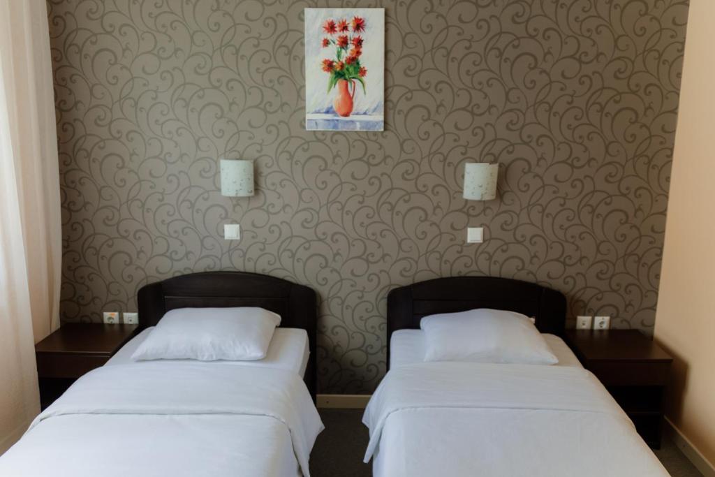 Postel nebo postele na pokoji v ubytování Hotel Drinska lasta