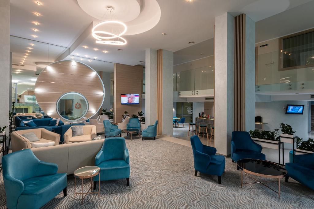 TV a/nebo společenská místnost v ubytování Hotel Neptun Beach