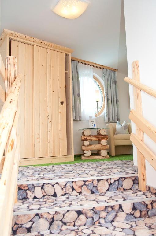 Postel nebo postele na pokoji v ubytování Hartweger's Hotel
