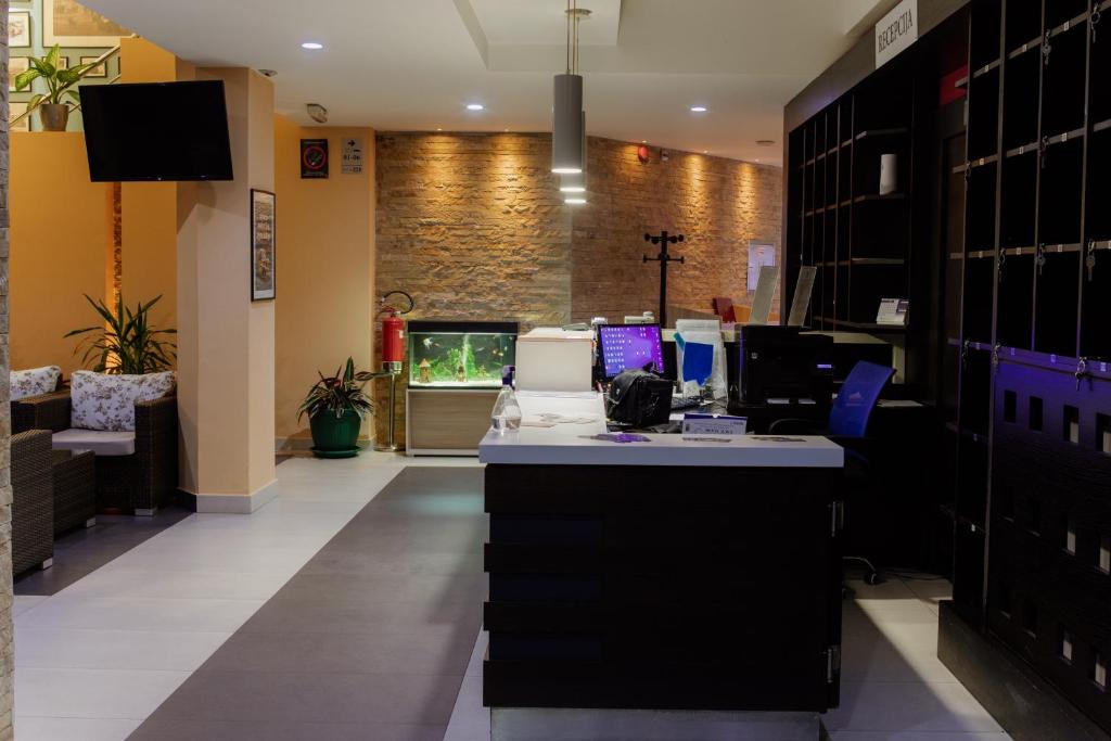 TV a/nebo společenská místnost v ubytování Hotel Drinska lasta